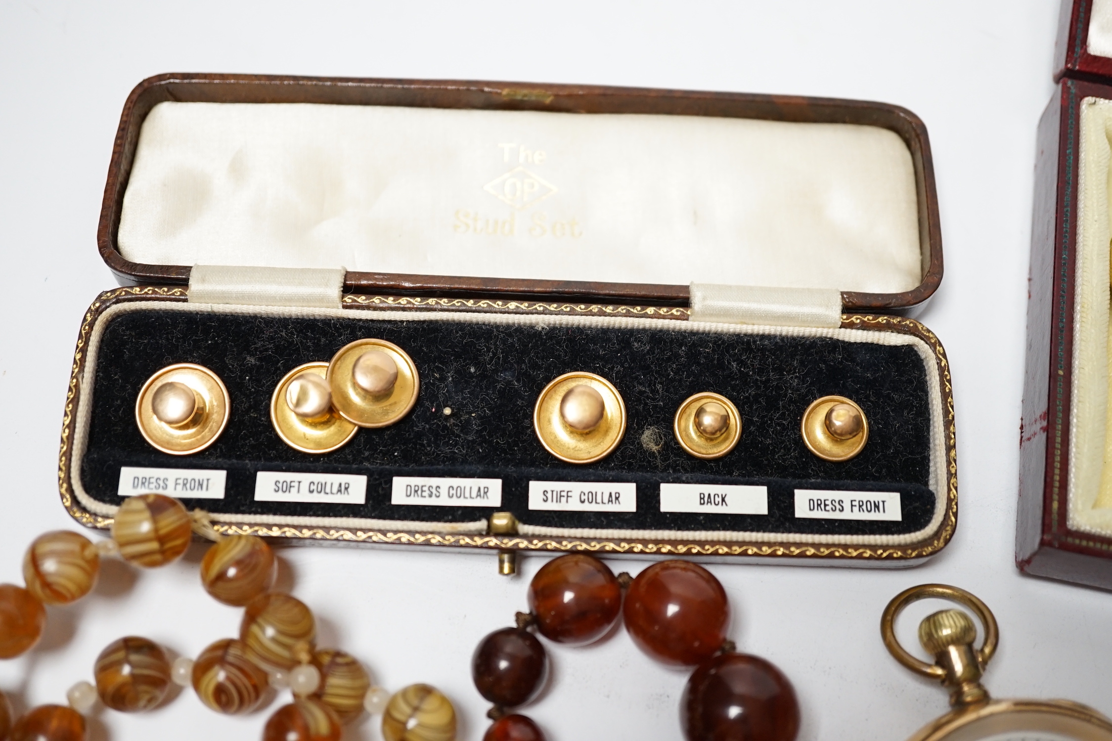 A pair of gilt metal Christian Dior tassel drop earrings and other jewellery, a wrist watch, pocket watch and a 9ct six piece dress stud set.